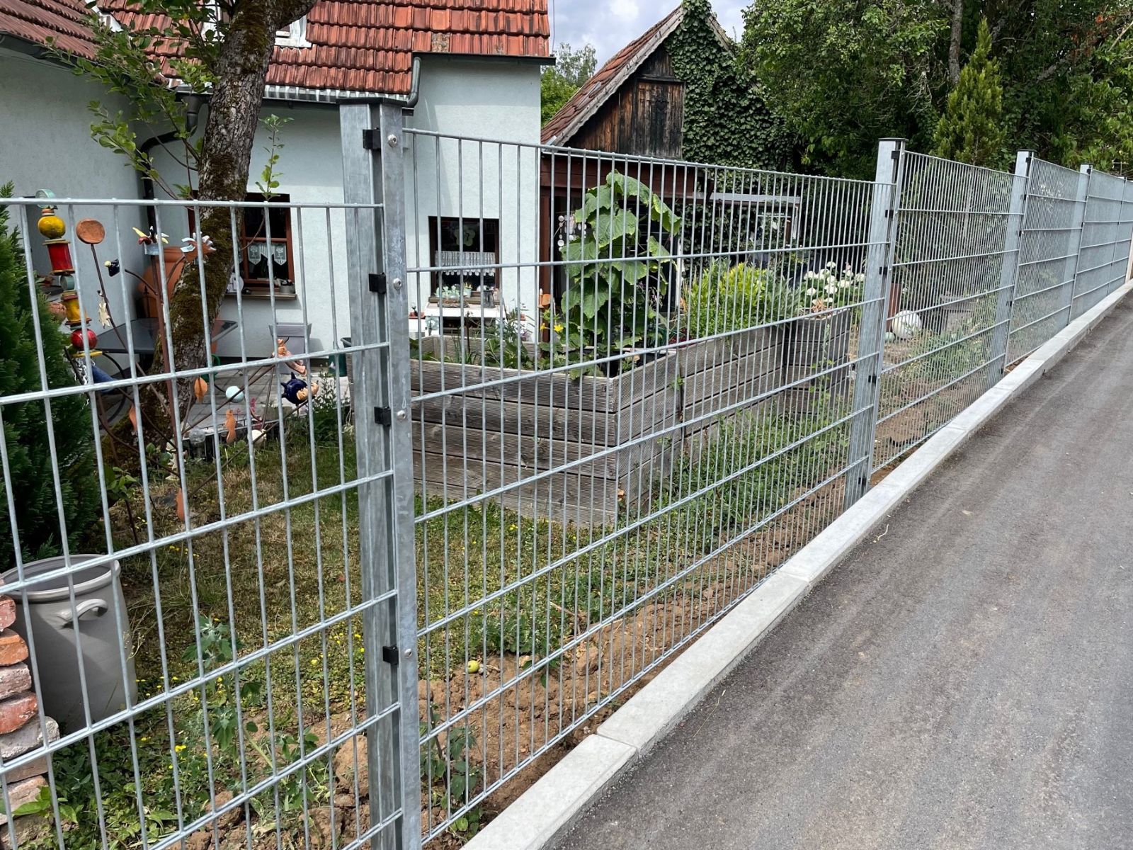 zaunbau hang steigung stufen